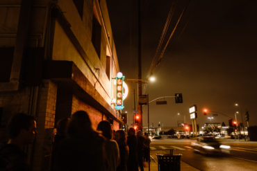 Crowd lines up outside Good Luck Bar.