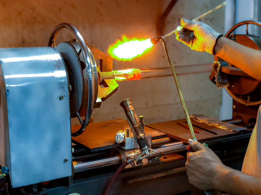 Worker using a torch for glasswork