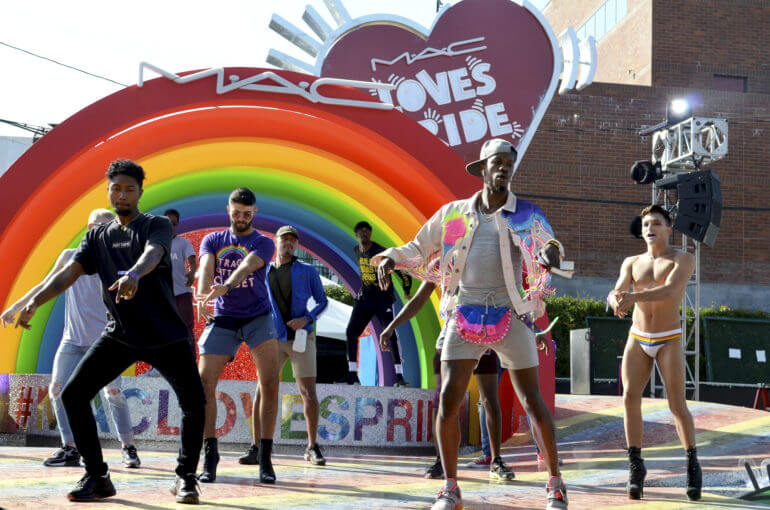 Dancers rehearse on the MAC Cosmetics stage.