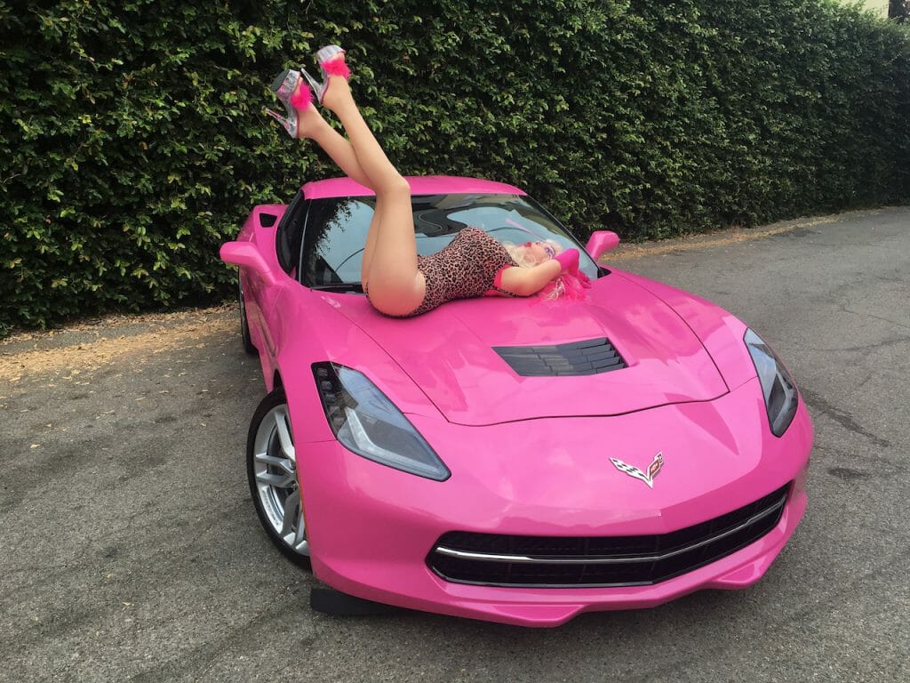 Angelyne and her beloved pink Corvette.