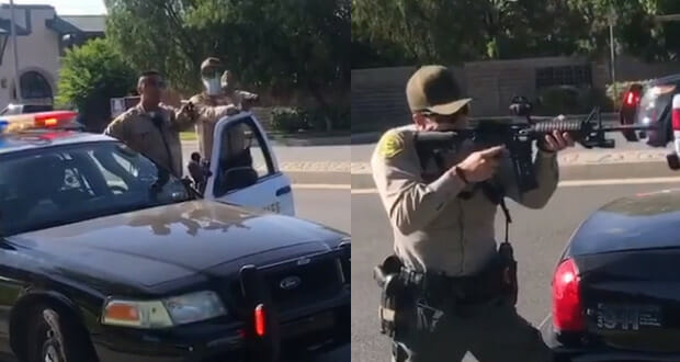 Screenshots from a bystander's video show multiple Santa Clarita sheriffs drawing guns on three Black teenagers who were being attacked by an unknown assailant.